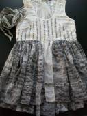 více - 1107 Nové fáčovinové šaty šedo-smetanové zdobené flitry  NEXT  v.36