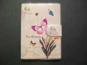 zvětšit obrázek - Malý linkovaný bloček  A7 v plast.obalu na suchý zip  - sv.růžový s motýlky