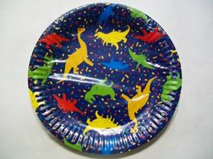 zvětšit obrázek - Papírové párty talíře tm.modré s dinosaury      průměr 23cm  10ks
