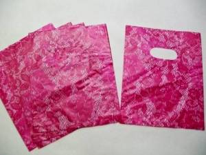 zvětšit obrázek - Mikrotenová taštička na drobnosti  16 x 20cm, růžově květovaná  10ks